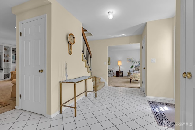 21 Van Hise Ct, East Brunswick, NJ 08816 - entryway featuring light carpet, stairs, and light tile patterned floors