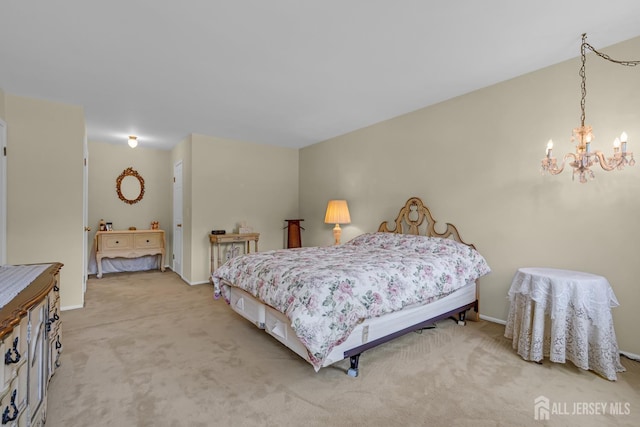 21 Van Hise Ct, East Brunswick, NJ 08816 - bedroom featuring a chandelier and light colored carpet