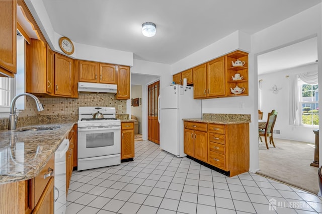 21 Van Hise Ct, East Brunswick, NJ 08816 - kitchen featuring white appliances, under cabinet range hood, light colored carpet, and brown cabinets