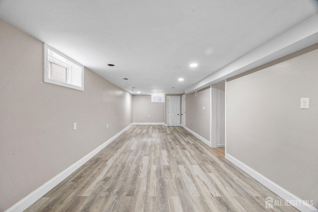 basement with light wood-type flooring