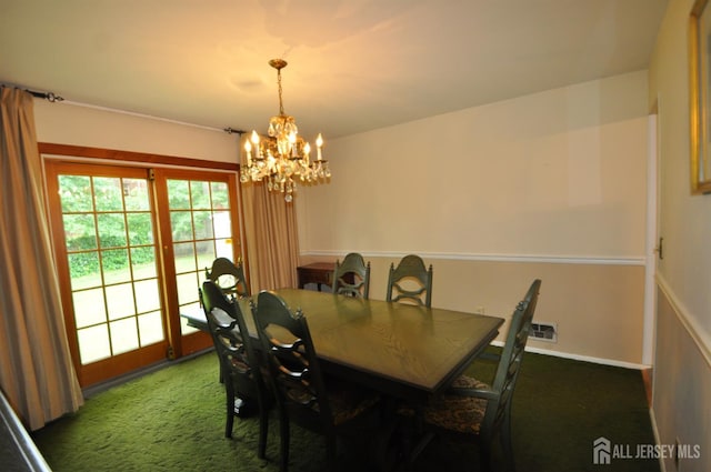 19 Clark Pl, Avenel, NJ 07001 - carpeted dining room featuring a chandelier