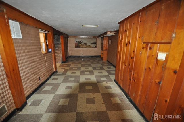 19 Clark Pl, Avenel, NJ 07001 - hall featuring tile patterned floors and wood walls