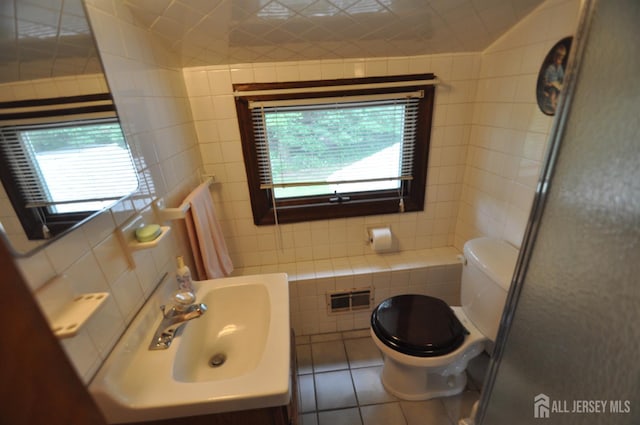 19 Clark Pl, Avenel, NJ 07001 - bathroom with tile walls, tile patterned floors, and vanity