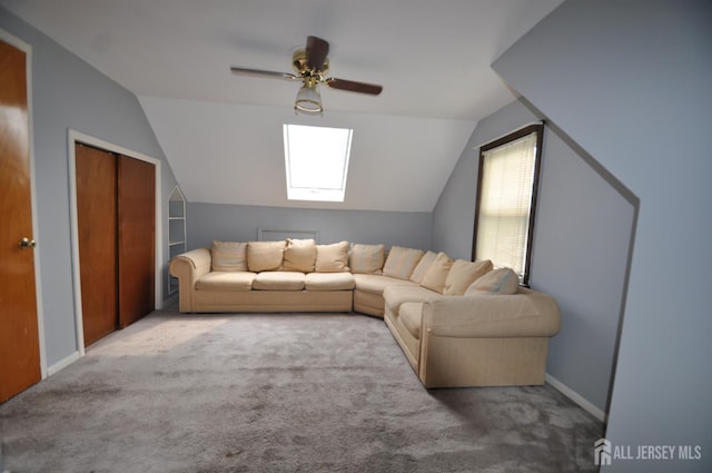 19 Clark Pl, Avenel, NJ 07001 - living area with lofted ceiling, carpet floors, and ceiling fan
