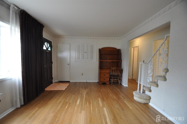 19 Clark Pl, Avenel, NJ 07001 - entrance foyer featuring light wood-style flooring and stairs
