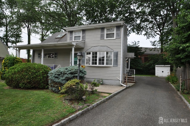 19 Clark Pl, Avenel, NJ 07001 - traditional-style house featuring driveway and a front yard
