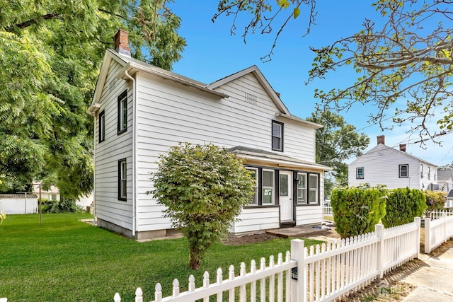 33 Stockton Ave, Jamesburg, NJ 08831 - view of front facade with a chimney and a sunroom