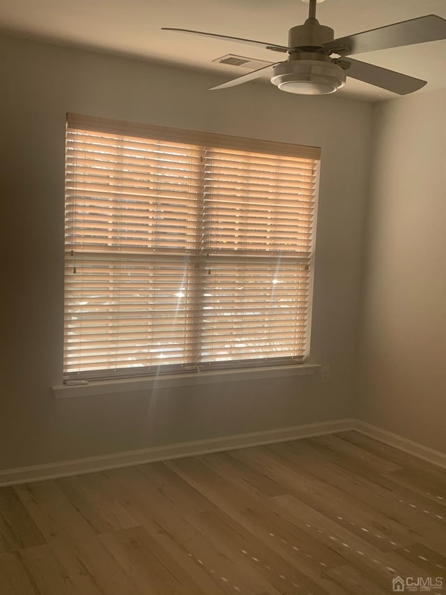 1156 Morning Glory Dr, Monroe, NJ 08831 - unfurnished room featuring a ceiling fan, wood finished floors, and baseboards