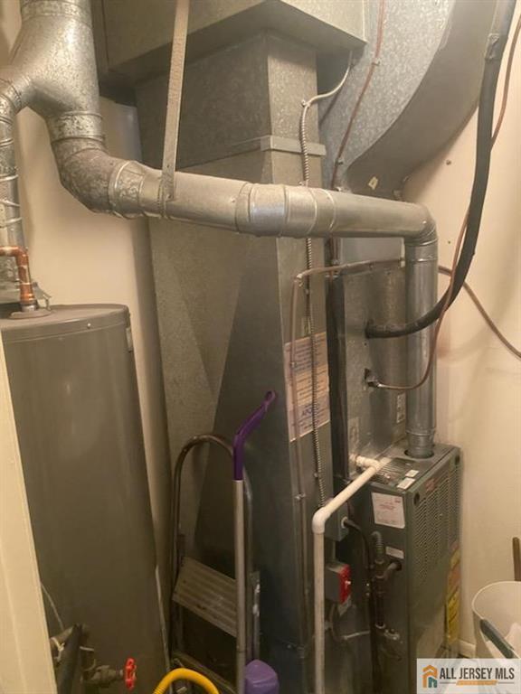 100 Neilly Ct Unit 100, Old Bridge, NJ 08857 - utility room with gas water heater