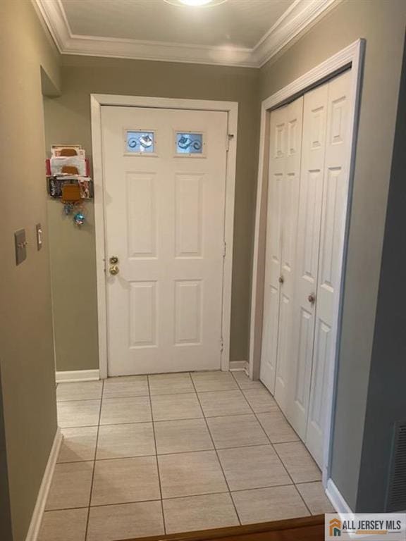 100 Neilly Ct Unit 100, Old Bridge, NJ 08857 - entryway with light tile patterned flooring, baseboards, and crown molding