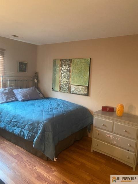 100 Neilly Ct Unit 100, Old Bridge, NJ 08857 - bedroom with wood finished floors
