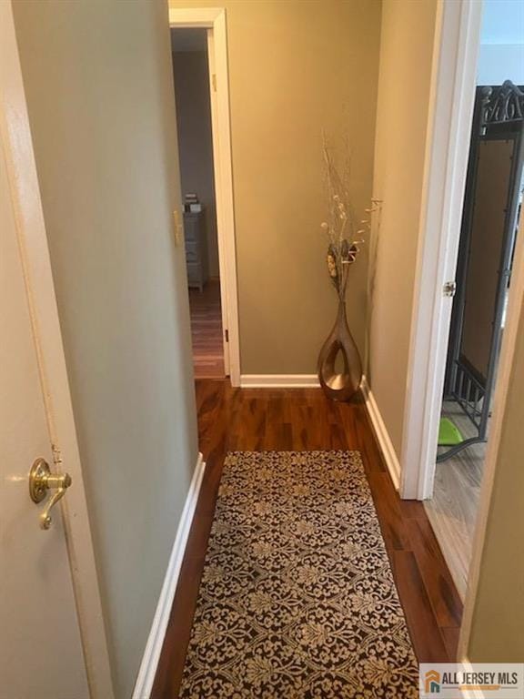 100 Neilly Ct Unit 100, Old Bridge, NJ 08857 - hall featuring wood finished floors and baseboards