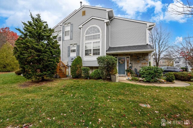 view of front property with a front yard