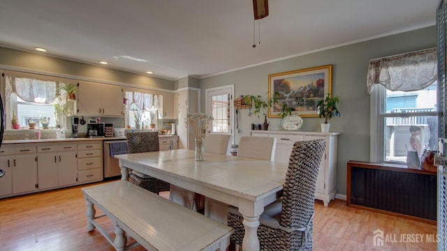 110 N Pine Ave, South Amboy, NJ 08879 - dining space with crown molding and light wood-style floors