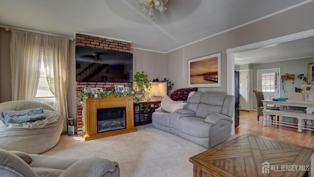 110 N Pine Ave, South Amboy, NJ 08879 - living room with a ceiling fan, ornamental molding, and a glass covered fireplace