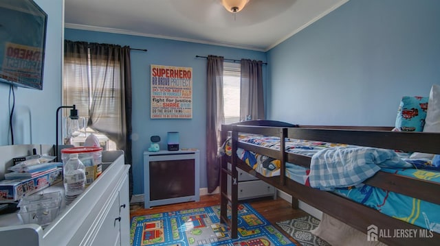 110 N Pine Ave, South Amboy, NJ 08879 - bedroom with wood finished floors, crown molding, and a ceiling fan