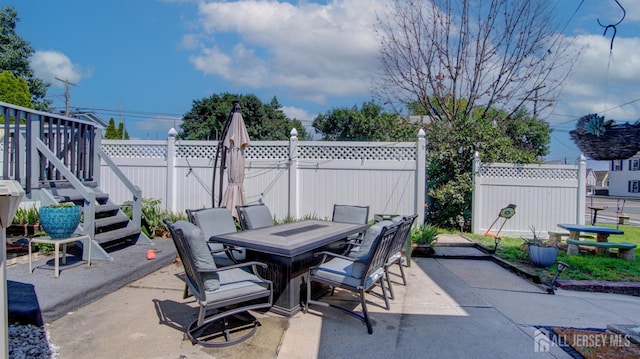 110 N Pine Ave, South Amboy, NJ 08879 - fenced backyard featuring outdoor dining area and a patio