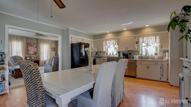 110 N Pine Ave, South Amboy, NJ 08879 - dining room with ceiling fan, light wood-style floors, crown molding, and recessed lighting