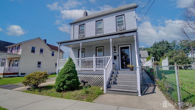 110 N Pine Ave, South Amboy, NJ 08879 - view of front of home featuring a porch, a chimney, a gate, and cooling unit