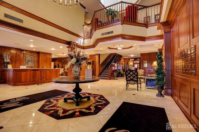 common area with visible vents and stairway