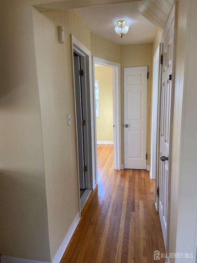 hall featuring hardwood / wood-style floors