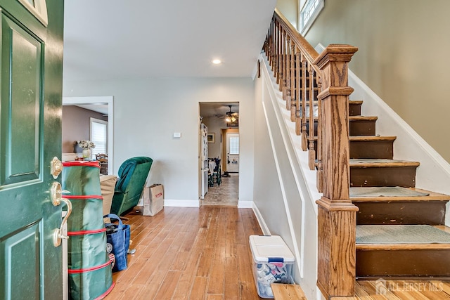127 Hill St, Highland Park, NJ 08904 - entryway featuring stairs, wood finished floors, healthy amount of natural light, ceiling fan, and recessed lighting