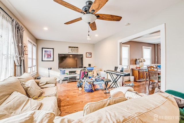 127 Hill St, Highland Park, NJ 08904 - living area featuring wood finished floors, ceiling fan, and recessed lighting