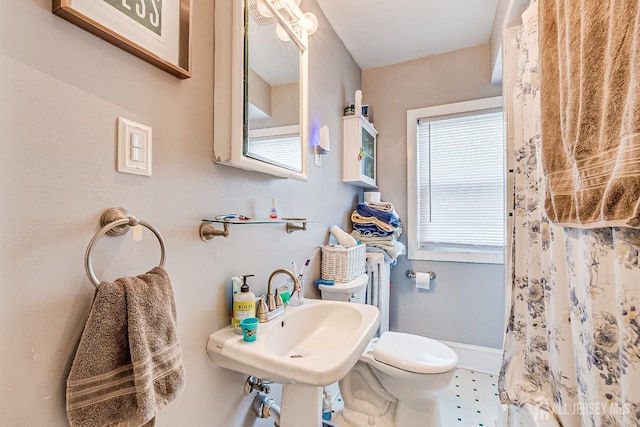 127 Hill St, Highland Park, NJ 08904 - bathroom with toilet and curtained shower