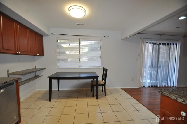 dining room with light tile patterned floors