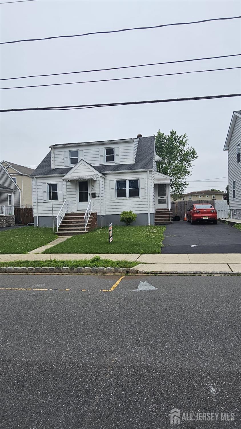36 Harris St, Carteret, NJ 07008 - traditional home with entry steps and a front yard