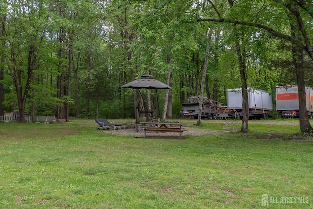 144 E Greystone Rd Unit 146, Old Bridge, NJ 08857 - view of grassy yard featuring an outbuilding