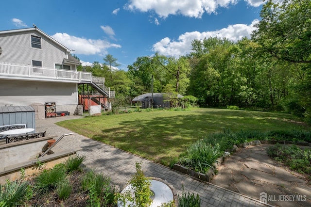144 E Greystone Rd Unit 146, Old Bridge, NJ 08857 - view of green lawn featuring stairs and a patio area
