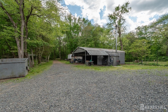 144 E Greystone Rd Unit 146, Old Bridge, NJ 08857 - view of outbuilding with gravel driveway and an outbuilding