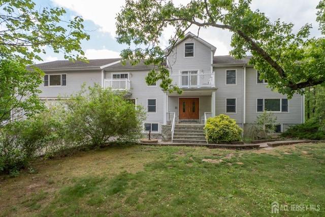 144 E Greystone Rd Unit 146, Old Bridge, NJ 08857 - view of front of property with a front yard and a balcony