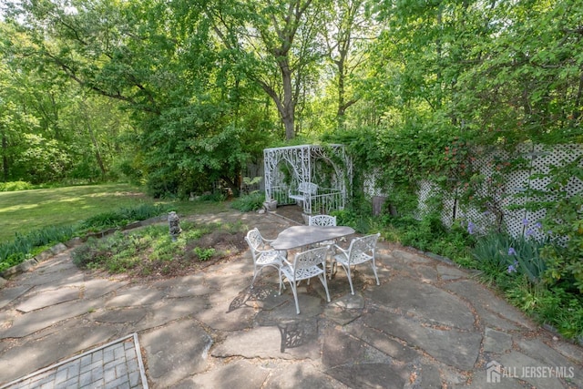 144 E Greystone Rd Unit 146, Old Bridge, NJ 08857 - view of patio featuring outdoor dining space
