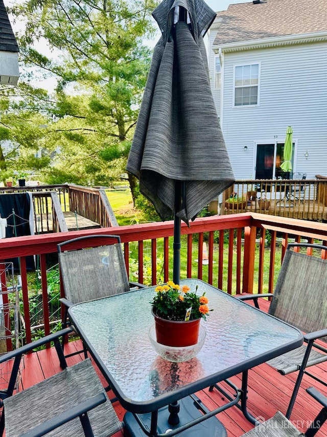 91 Heather Ct, South Brunswick, NJ 08852 - wooden terrace featuring outdoor dining space