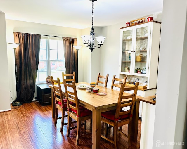 91 Heather Ct, South Brunswick, NJ 08852 - dining area featuring wood finished floors and a chandelier