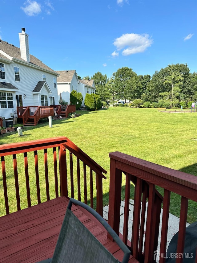 91 Heather Ct, South Brunswick, NJ 08852 - wooden terrace featuring a yard and a residential view