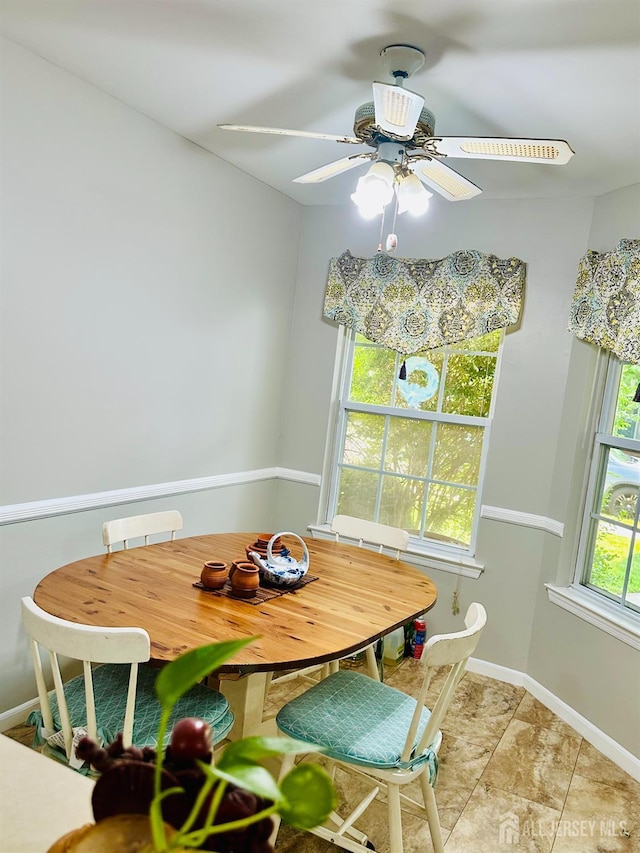91 Heather Ct, South Brunswick, NJ 08852 - dining space with light tile patterned floors and a ceiling fan