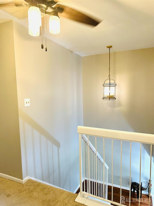 91 Heather Ct, South Brunswick, NJ 08852 - stairway with a ceiling fan and carpet floors
