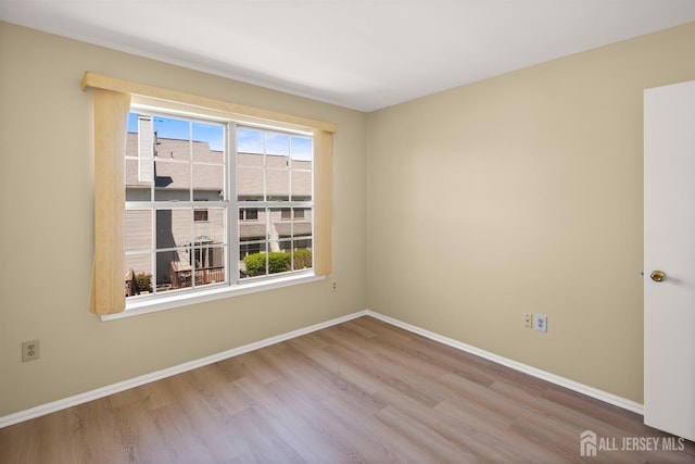 204 Concord Pl, North Brunswick, NJ 08902 - unfurnished room with healthy amount of natural light and wood finished floors
