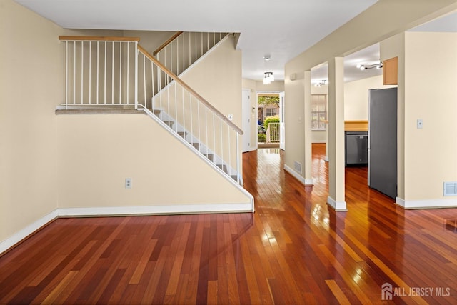 204 Concord Pl, North Brunswick, NJ 08902 - stairs featuring hardwood / wood-style floors and baseboards