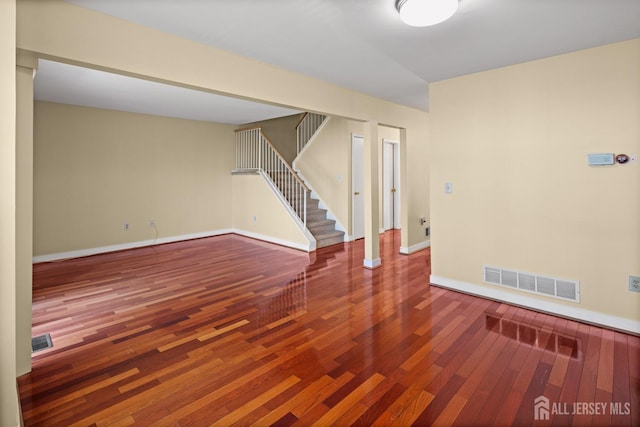 204 Concord Pl, North Brunswick, NJ 08902 - below grade area featuring stairway and wood-type flooring