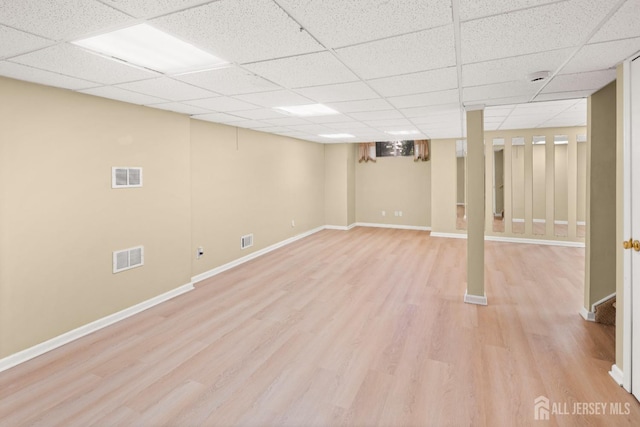 204 Concord Pl, North Brunswick, NJ 08902 - finished below grade area with light wood finished floors and a drop ceiling