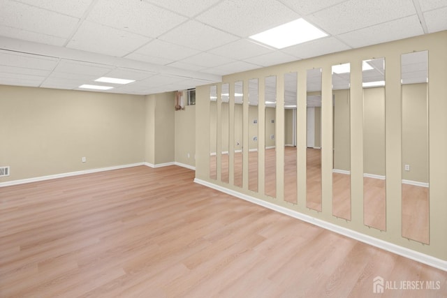 204 Concord Pl, North Brunswick, NJ 08902 - finished below grade area featuring a paneled ceiling and wood finished floors