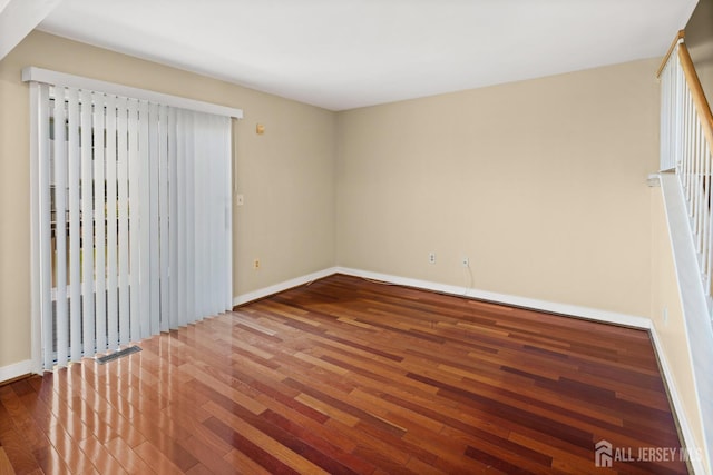 204 Concord Pl, North Brunswick, NJ 08902 - unfurnished room featuring wood-type flooring and baseboards