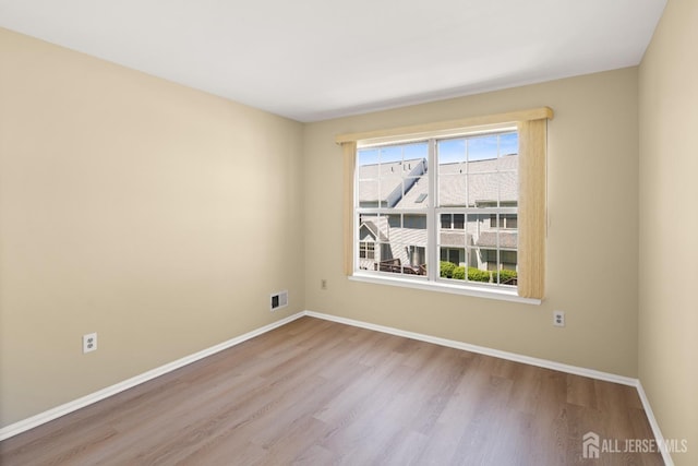 204 Concord Pl, North Brunswick, NJ 08902 - unfurnished room with wood finished floors and baseboards