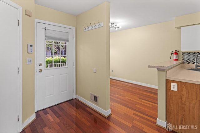 204 Concord Pl, North Brunswick, NJ 08902 - doorway with wood finished floors