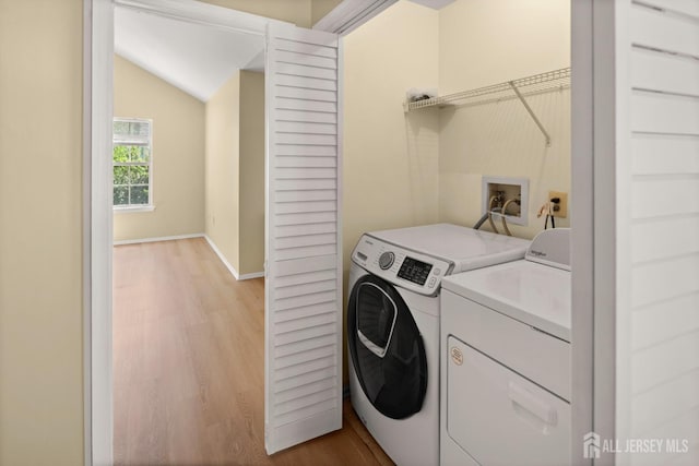 204 Concord Pl, North Brunswick, NJ 08902 - laundry room with separate washer and dryer and light wood-type flooring