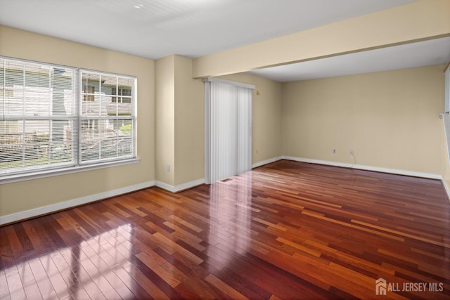 204 Concord Pl, North Brunswick, NJ 08902 - empty room with baseboards and wood finished floors